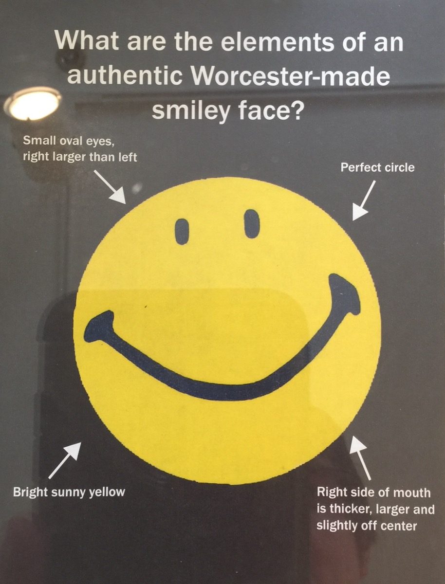 An authentic Harvey Ball smiley-face pin from Worcester, Massachusetts, on display at the Worcester Historical Museum